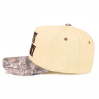 God’s Country Trucker Hat – Cream & Camo Brim